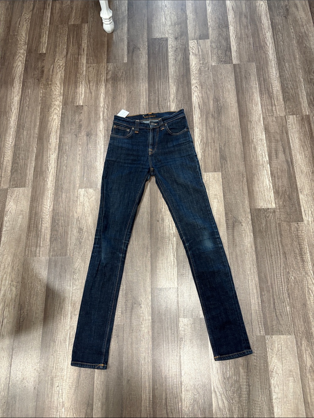 Women’s vintage dark blue skinny jeans with orange detailing